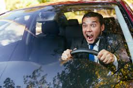 A man yelling at other drivers;