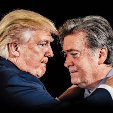 Donald Trump looking away as his hands rest on Steven Bannon's shoulders;