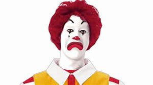 Ronald McDonald looking sad;