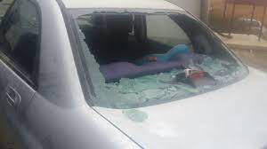 Smashed car window;