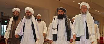 Taliban leaders walking in a building like they are all Mr Big;