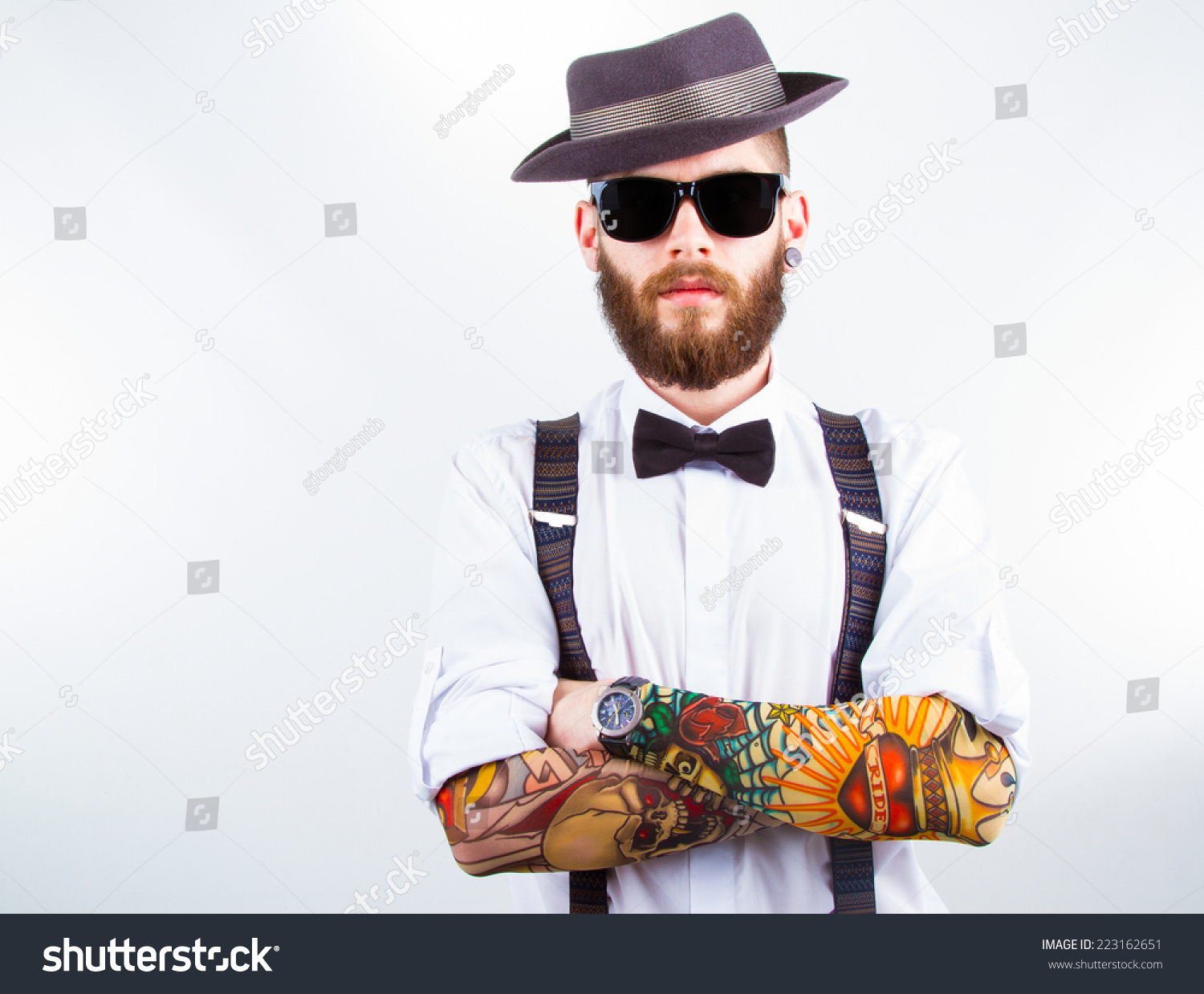 Tatooed Dued Wearing Bow Tie;