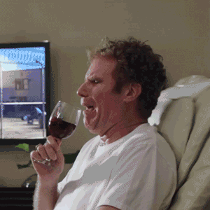 Will Ferrell cryiing while trying to drink wine in a hospital bed;