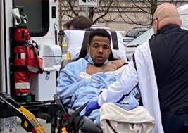 Yannick Bandaogo Lynn Valley Public Library Stabber in North Vancouver laying out on a gurney probably thinking about how he's messed up;